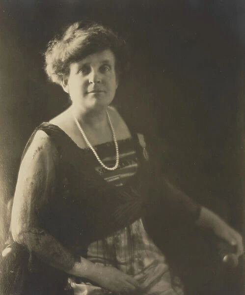 Frances Benjamin Johnston, photographer, posed wearing a pearl necklace... Palme acade´mique, c1930 Creator: Anthony Bacon