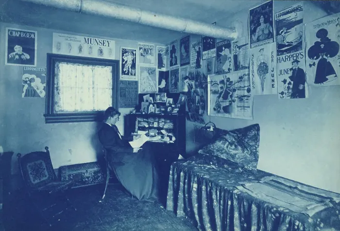 Framed Print : Frances Benjamin Johnston seated at a desk in her studio / office, with adverstising... c1896. Creator: Frances Benjamin Johnston