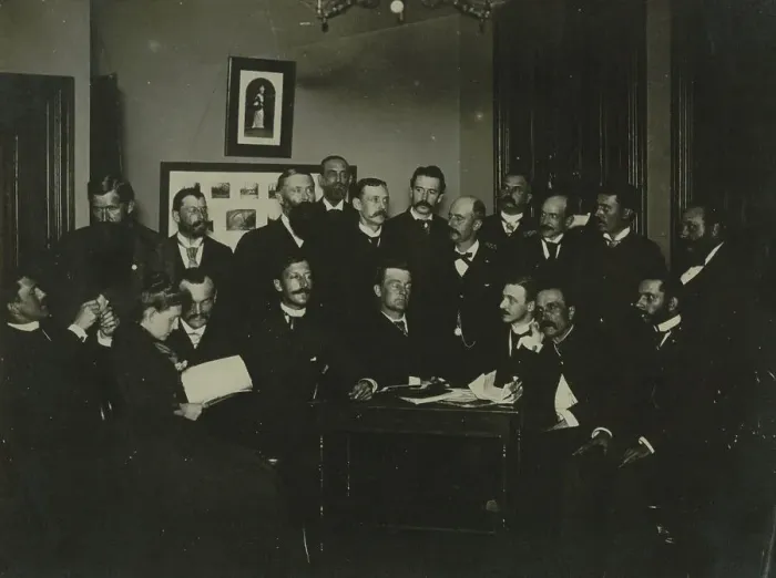 Framed Print : Frances Benjamin Johnston, seated in profile at left, group portrait with 18... c1880 - 1900. Creator: Frances Benjamin Johnston Framed Print : Frances Benjamin Johnston, seated in profile at left, group portrait with 18... c1880 - 1900. Creator: Frances Benjamin Johnston