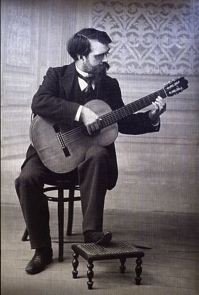Francisco Tarrega Eixea (1852-1909), guitarist and composer, portrait playing guitar