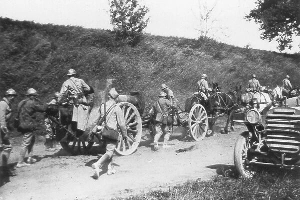 French artillery battery on the move, Chemin des Dames, France, 1918
