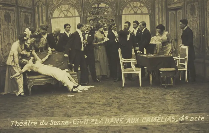 Framed Print : French or Belgian prisoners of war, some in drag, posing on stage during a crowded scene... [1918?] Creator: Unknown