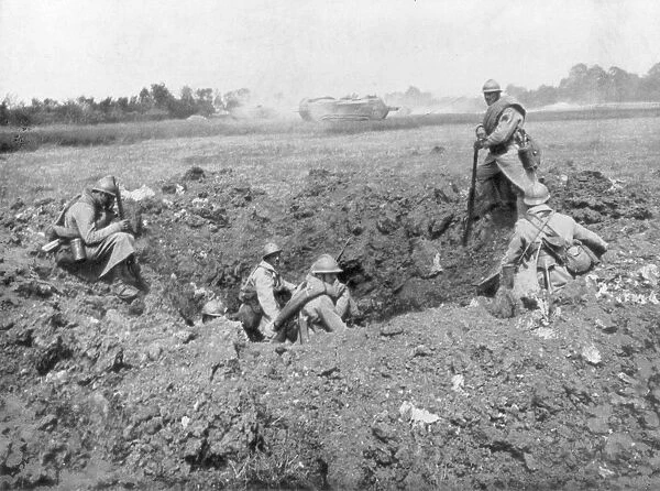 French infantry resting in a shell hole, Chemin des Dames, France, 11 June 1918