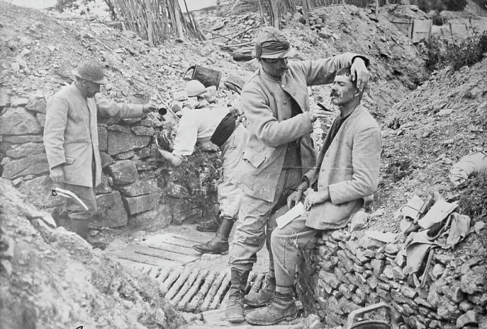 Framed Print : French trench barber, between c1915 and 1918. Creator: Bain News Service Framed Print : French trench barber, between c1915 and 1918. Creator: Bain News Service