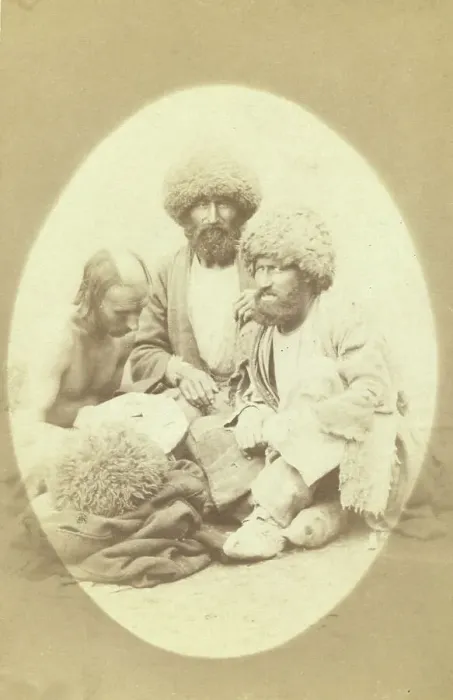 Framed Print : Full-length portrait of three men, seated on ground, facing front, between 1870 and 1886. Creator: Unknown
