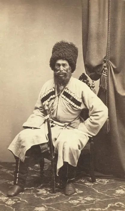 Framed Print : Full-length portrait of Transcaucasian man, seated, facing front, between 1870 and 1886. Creator: Unknown Framed Print : Full-length portrait of Transcaucasian man, seated, facing front, between 1870 and 1886. Creator: Unknown