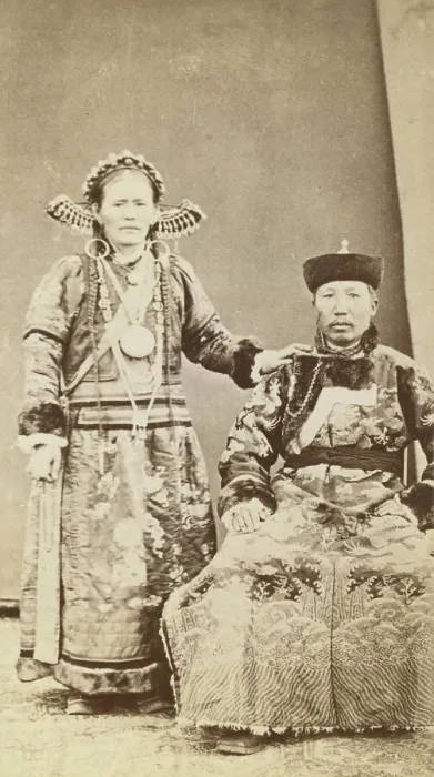 Framed Print : Full-length portrait of wealthy Buriat man and his wife, facing front, between 1870 and 1886. Creator: Unknown Framed Print : Full-length portrait of wealthy Buriat man and his wife, facing front, between 1870 and 1886. Creator: Unknown