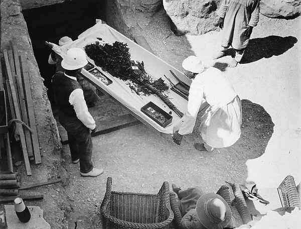 Funeral bouquet being removed from the tomb of Tutankhamun, Valley of the Kings, Egyp, 1922