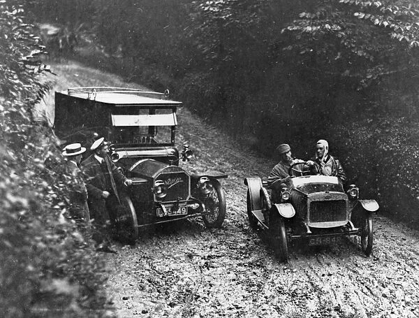 G. W. K passing Napier on very muddy track circa 1915. Creator: Unknown