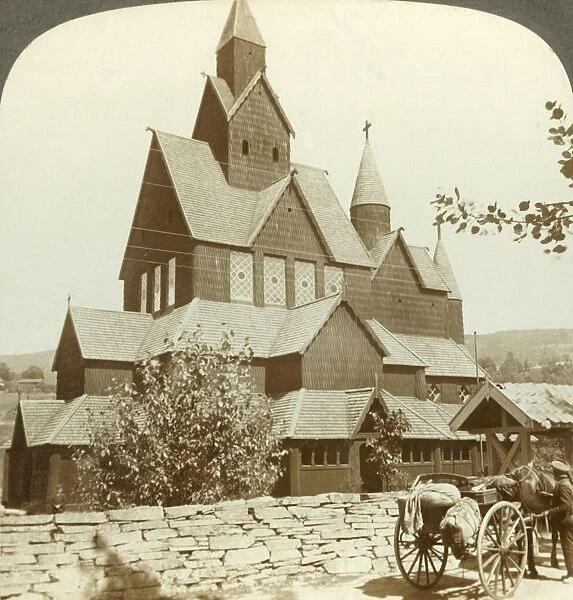 Many gabled timber church with 12th century arcade and turrets, Hitterdal, Norway, c1905