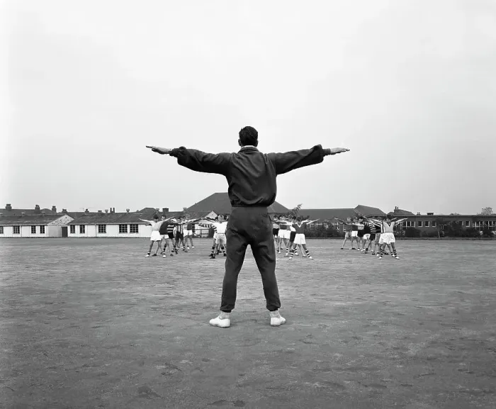 Framed Print : Games master taking a gym class, Airedale school, Castleford, West Yorkshire, 1962 Framed Print : Games master taking a gym class, Airedale school, Castleford, West Yorkshire, 1962