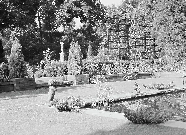 Garden, East Hampton, Long Island, between 1933 and 1942. Creator: Arnold Genthe
