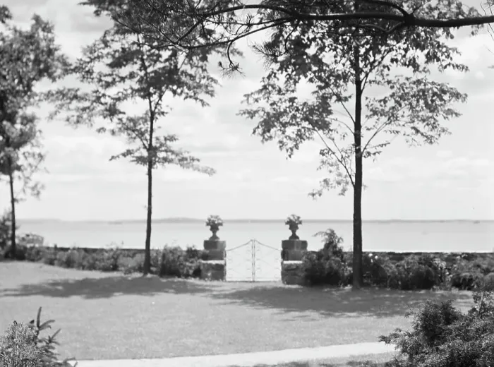 Framed Print : Garden overlooking water, East Hampton, Long Island, between 1933 and 1942. Creator: Arnold Genthe Framed Print : Garden overlooking water, East Hampton, Long Island, between 1933 and 1942. Creator: Arnold Genthe