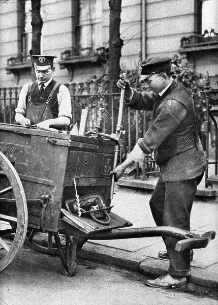 A gas fitter, London, 1926-1927. Artist: McLeish