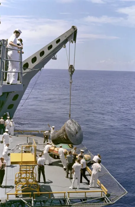 Framed Print : Gemini 5 capsule hoisted onboard recovery ship, 1965. Creator: NASA Framed Print : Gemini 5 capsule hoisted onboard recovery ship, 1965. Creator: NASA