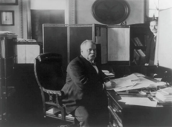 General Fitzhugh Lee, three-quarter length portrait, seated at desk... between 1890 and 1905. Creator: Frances Benjamin Johnston