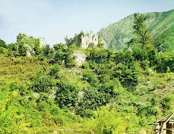 General view of the ruins of a castle near the Bzyb River, from the highway, between 1905 and 1915. Creator: Sergey Mikhaylovich Prokudin-Gorsky