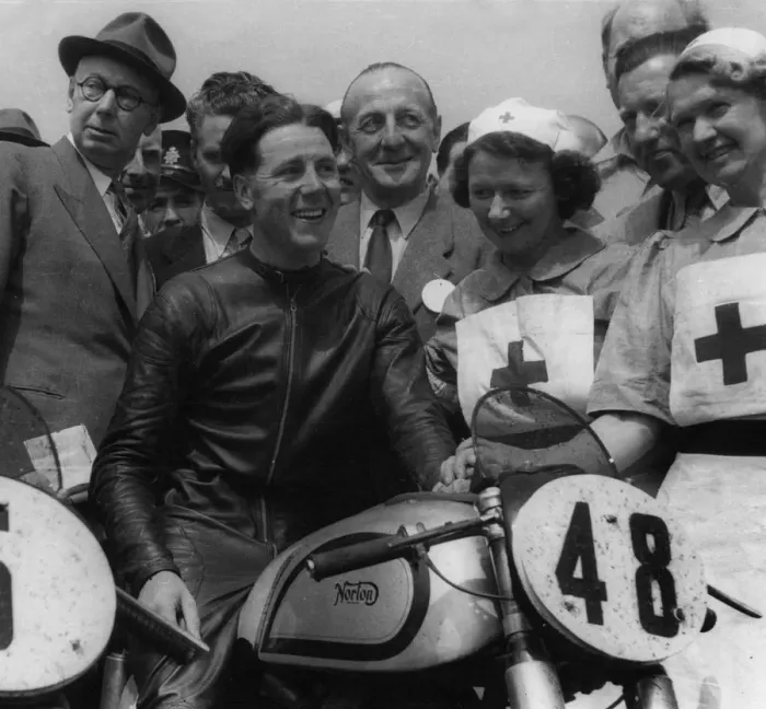 Framed Print : Geoff Duke on Norton, with nurses after race in 1951. Creator: Unknown Framed Print : Geoff Duke on Norton, with nurses after race in 1951. Creator: Unknown