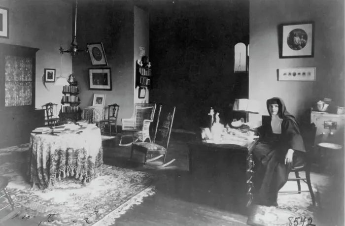 Framed Print : Georgetown Convent, Washington, D.C. - nun seated at desk in furnished room, not after 1892. Creator: Frances Benjamin Johnston Framed Print : Georgetown Convent, Washington, D.C. - nun seated at desk in furnished room, not after 1892. Creator: Frances Benjamin Johnston