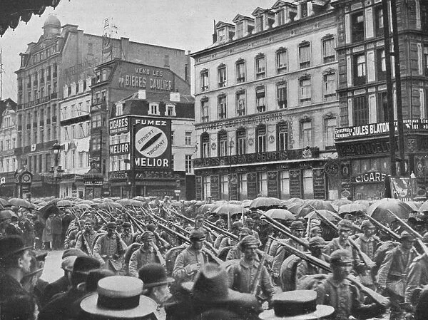 German infantry entering Brussels in the rain, 1914