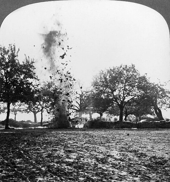 A German shell exploding, World War I, 1914-1918. Artist: Realistic Travels Publishers