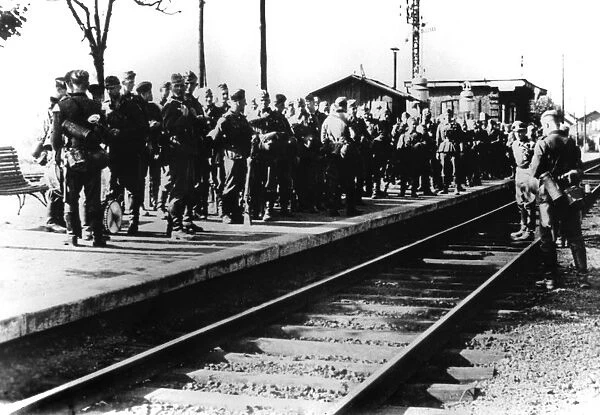 German soldiers on a railway platform awaiting transport, Paris, August 1940