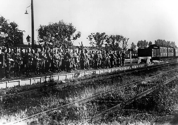 German soldiers on a railway platform awaiting transport, France, August 1940