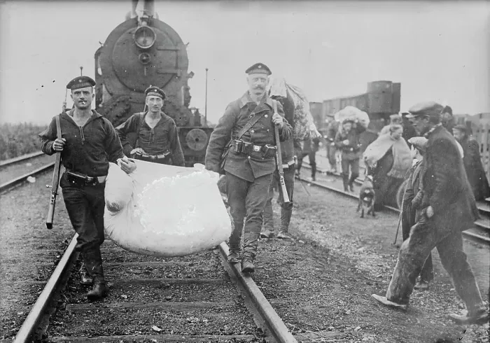 Framed Print : Germans helping refugees returning to Antwerp, 1914. Creator: Bain News Service Framed Print : Germans helping refugees returning to Antwerp, 1914. Creator: Bain News Service