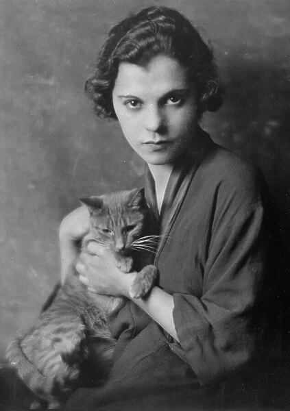 Gervais, Blanche, Miss, with Buzzer the cat, portrait photograph, 1916. Creator: Arnold Genthe