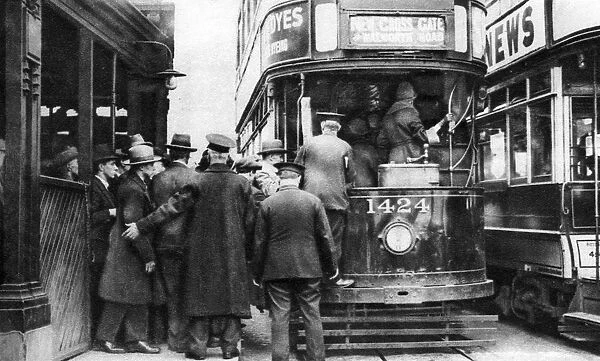 Getting on to a tram at Blackfriars, London, 1926-1927