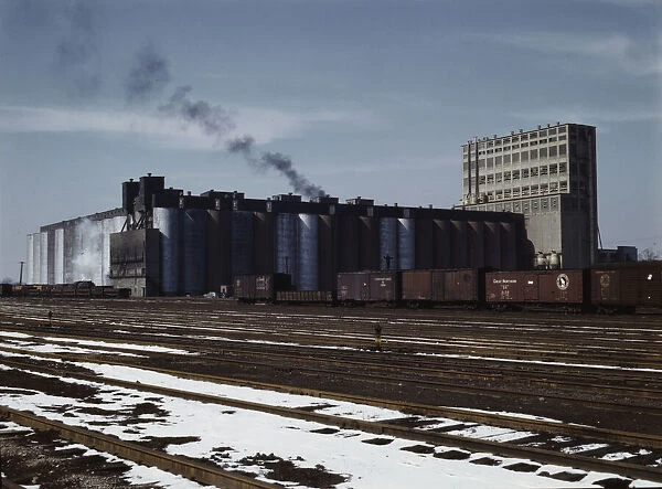 The giant Santa Fe R. R. 10 million bushel grain elevator, Kansas, 1943. Creator: Jack Delano