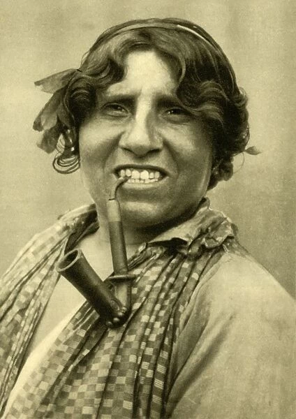 Gipsy woman smoking a pipe, Burgenland, Austria, c1935. Creator: Unknown