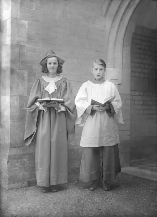 Framed Print : Girl and boy chorister, (Isle of Wight?), c1935. Creator: Kirk & Sons of Cowes Framed Print : Girl and boy chorister, (Isle of Wight?), c1935. Creator: Kirk & Sons of Cowes