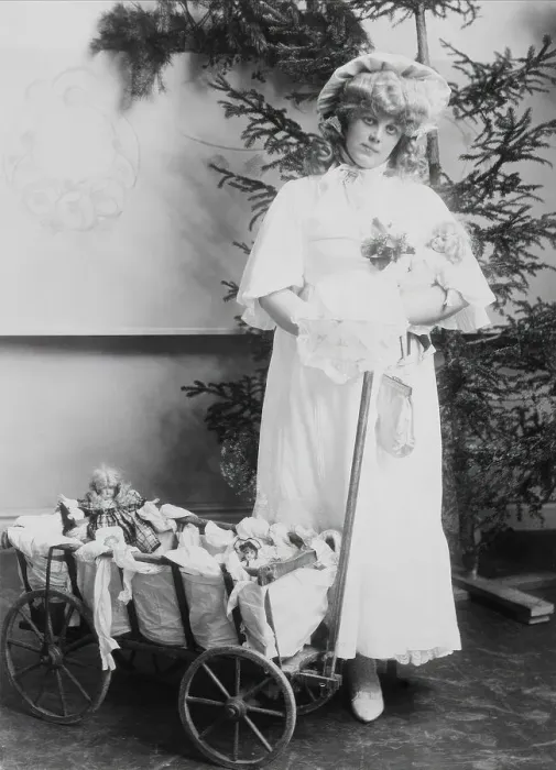 Framed Print : Girl with dolls and doll carriage, 1900. Creator: Unknown Framed Print : Girl with dolls and doll carriage, 1900. Creator: Unknown
