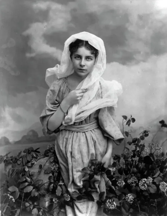 Framed Print : Girl and flowers, c1897. Creator: Minnie Libby Framed Print : Girl and flowers, c1897. Creator: Minnie Libby