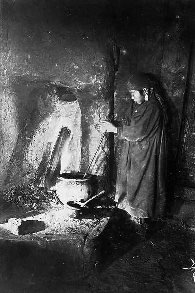 Girl at the hearth, late 19th cent - early 20th cent. Creator: I Popov
