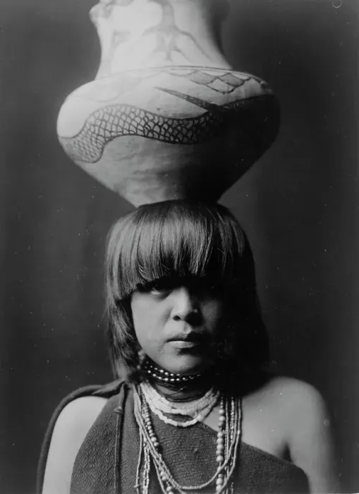 Framed Print : Girl and jar-San Ildefonso, c1927. Creator: Edward Sheriff Curtis Framed Print : Girl and jar-San Ildefonso, c1927. Creator: Edward Sheriff Curtis