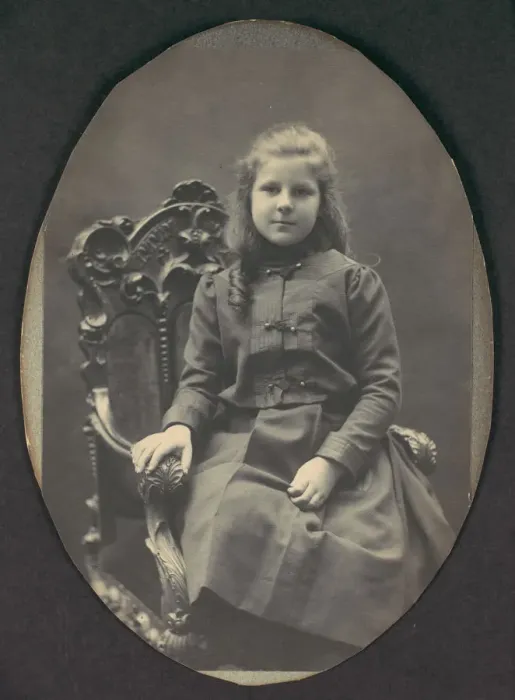 Framed Print : [Girl with Ringlets, Seated, Three-Quarter Length], 1890s. Creator: Frederick Gutekunst