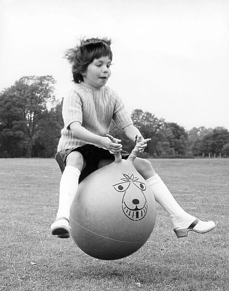 Girl on a space hopper, 1970s