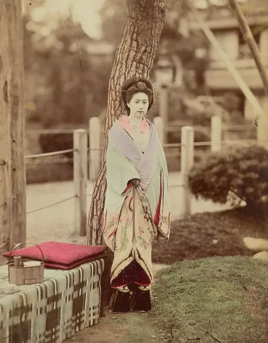 Framed Print : Girl standing near tree, 1870s-1890s. Creator: Kusakabe Kimbei Framed Print : Girl standing near tree, 1870s-1890s. Creator: Kusakabe Kimbei