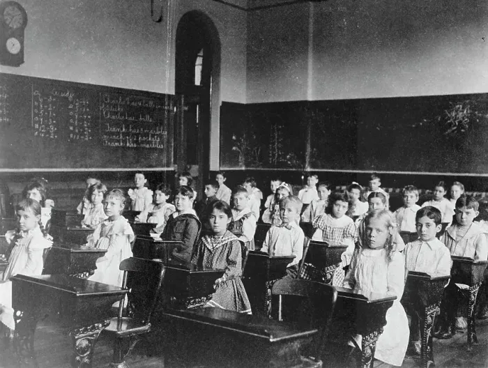 Framed Print : Girls and boys seated at desks in classroom, Washington, D.C. (1899?). Creator: Frances Benjamin Johnston Framed Print : Girls and boys seated at desks in classroom, Washington, D.C. (1899?). Creator: Frances Benjamin Johnston
