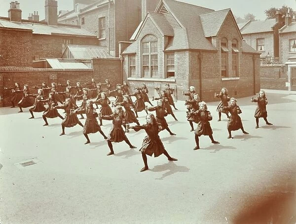 Girls doing drill in the playground, Wilton Road School, London, 1907