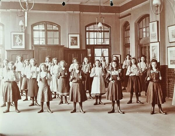 Girls holding Indian clubs, Cromer Street School  /  Argyle School, St Pancras, London, 1906