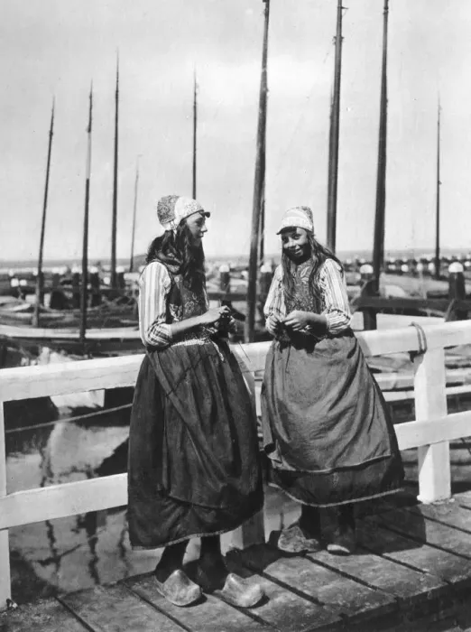 Framed Print : Two girls on the landing stage, Marken, Netherlands, c1934 Framed Print : Two girls on the landing stage, Marken, Netherlands, c1934