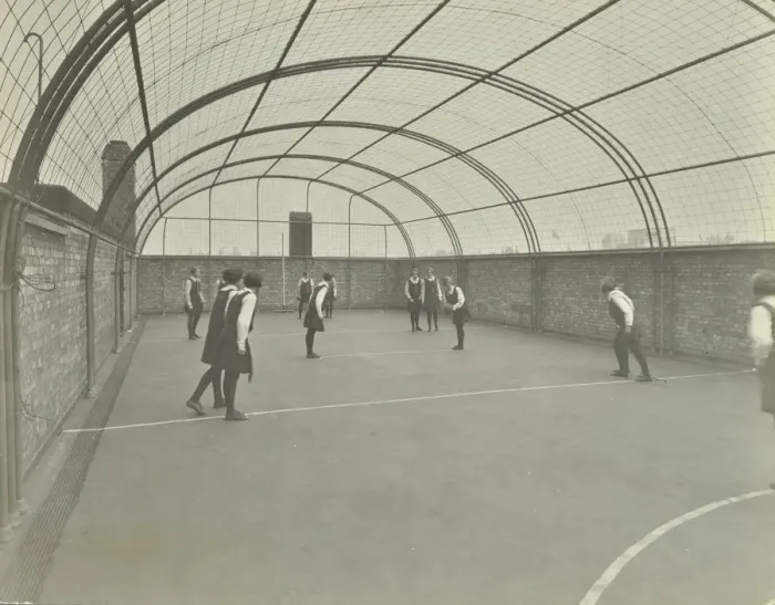Framed Print : Girls playing netball on a roof playground, Barrett Street Trade School, London, 1927 Framed Print : Girls playing netball on a roof playground, Barrett Street Trade School, London, 1927
