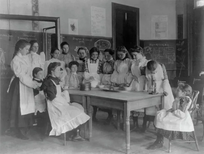 Framed Print : Girls posed in home economics class, 1st Division, Washington, D.C. (1899?). Creator: Frances Benjamin Johnston
