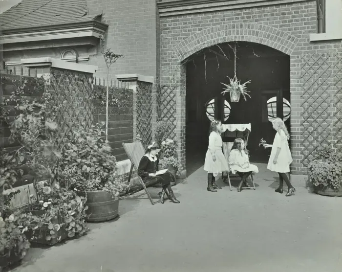 Framed Print : Girls relaxing in a roof top garden, White Lion Street School, London, 1912 Framed Print : Girls relaxing in a roof top garden, White Lion Street School, London, 1912