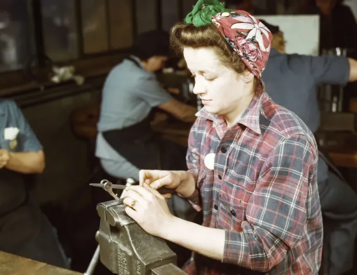Framed Print : One of the girls of Vilter [Manufacturing] Co. filing small gun parts, Milwaukee, Wisc. 1943. Creator: Howard Hollem