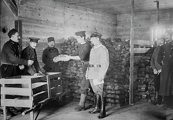 Giving Bread to British prisoners, between 1914 and c1915. Creator: Bain News Service
