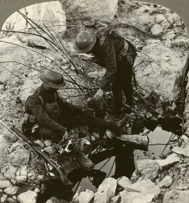 Framed Print : Giving water to a wounded pal, Hooge, Ypres, Belgium, World War I, 1914-1918. Artist: Realistic Travels Publishers Framed Print : Giving water to a wounded pal, Hooge, Ypres, Belgium, World War I, 1914-1918. Artist: Realistic Travels Publishers